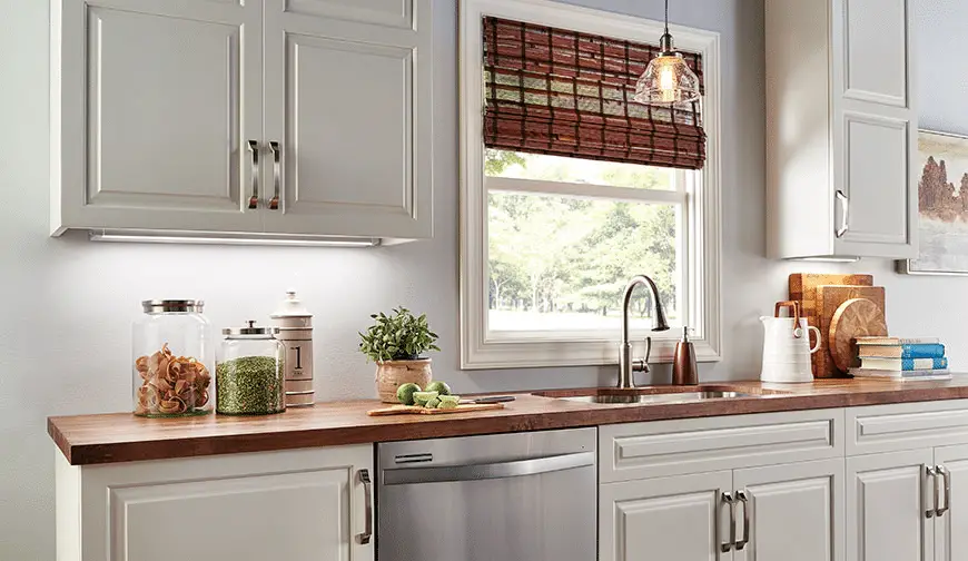 Add some more light or open the window to make small kitchen look bigger idea