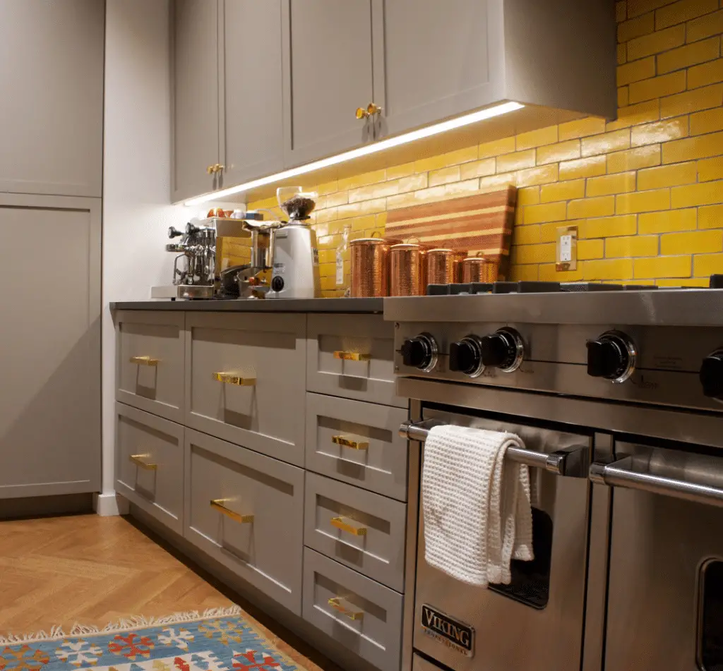 Add some led light line under cabinets to make small kitchen look bigger